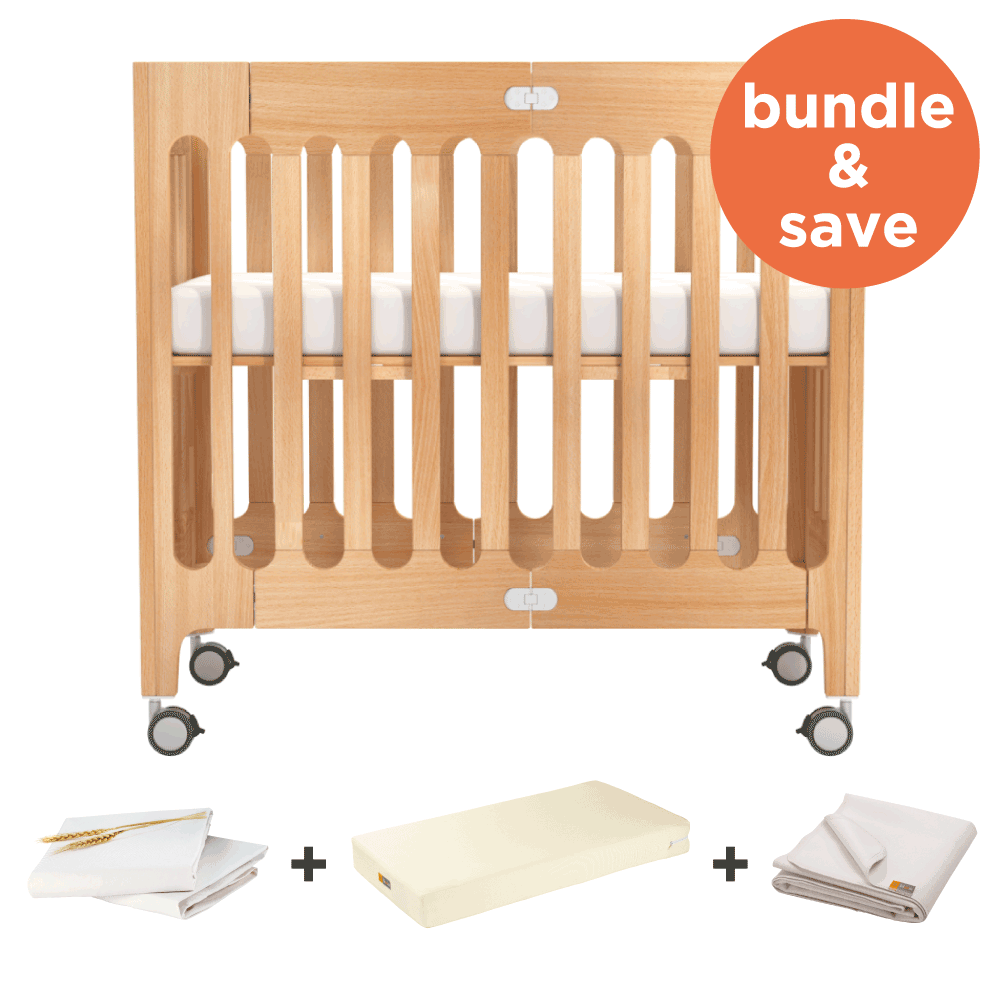 Natural wood mini crib store